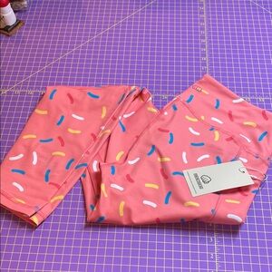 Feed Me Fight Me Pink Sprinkle Leggings Medium NWT